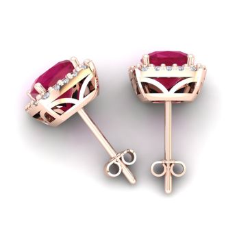 3 Carat Cushion Cut Ruby and Halo Diamond Stud Earrings In 14 Karat Rose Gold