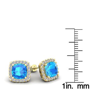 4 Carat Cushion Cut Blue Topaz and Halo Diamond Stud Earrings In 14 Karat Yellow Gold
