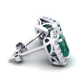 3 1/2 Carat Cushion Cut Emerald and Halo Diamond Stud Earrings In 14 Karat White Gold