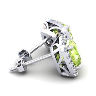 5 3/4 Carat Cushion Cut Peridot and Halo Diamond Stud Earrings In 14 Karat White Gold