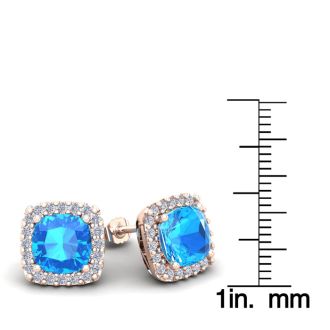 6 Carat Cushion Cut Blue Topaz and Halo Diamond Stud Earrings In 14 Karat Rose Gold