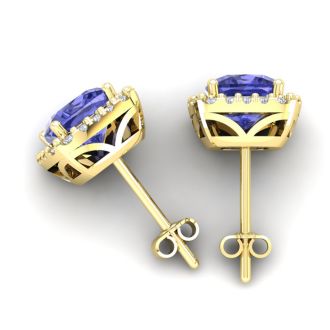 5 3/4 Carat Cushion Cut Tanzanite and Halo Diamond Stud Earrings In 14 Karat White Gold