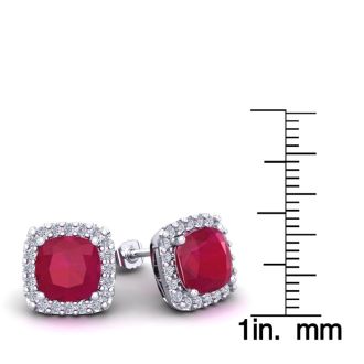 6 3/4 Carat Cushion Cut Ruby and Halo Diamond Stud Earrings In 14 Karat White Gold