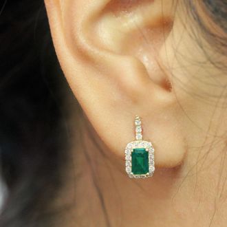 1 2/3 Carat Emerald and Halo Diamond Dangle Earrings In 14 Karat Yellow Gold