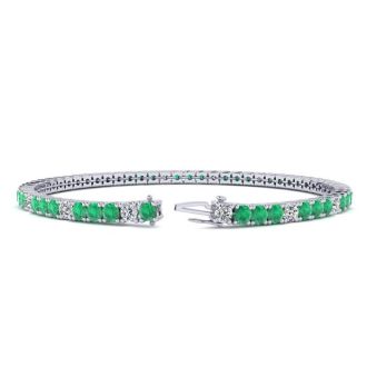 4 1/3 Carat Emerald And Diamond Graduated Tennis Bracelet In 14 Karat White Gold, 7 Inches