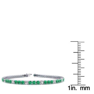 5 2/3 Carat Emerald And Diamond Graduated Tennis Bracelet In 14 Karat White Gold, 9 Inches