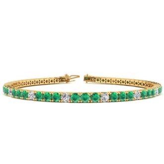 5 1/3 Carat Emerald And Diamond Graduated Tennis Bracelet In 14 Karat Yellow Gold, 8 1/2 Inches