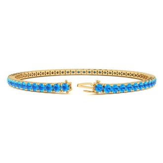 5 1/4 Carat Blue Topaz Tennis Bracelet In 14 Karat Yellow Gold, 7 Inches