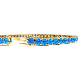 6 3/4 Carat Blue Topaz Tennis Bracelet In 14 Karat Yellow Gold, 9 Inches