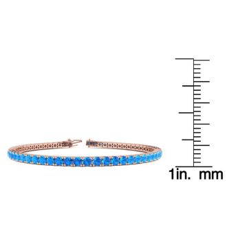 6 1/3 Carat Blue Topaz Tennis Bracelet In 14 Karat Rose Gold, 8 1/2 Inches