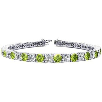 11 1/5 Carat Peridot and Diamond Tennis Bracelet In 14 Karat White Gold, 8 1/2 Inches
