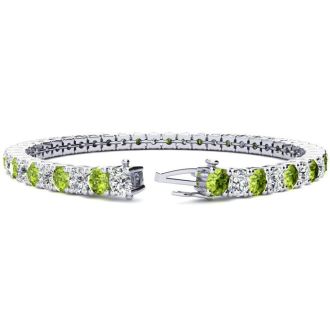 11 1/5 Carat Peridot and Diamond Tennis Bracelet In 14 Karat White Gold, 8 1/2 Inches