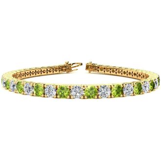 11 1/5 Carat Peridot and Diamond Tennis Bracelet In 14 Karat Yellow Gold, 8 1/2 Inches