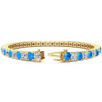 8 3/4 Carat Blue Topaz and Diamond Tennis Bracelet In 14 Karat Yellow Gold, 6 Inches