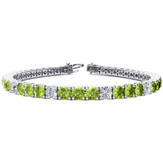 11 1/5 Carat Peridot and Diamond Alternating Tennis Bracelet In 14 Karat White Gold, 8 1/2 Inches