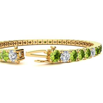 9 1/5 Carat Peridot and Diamond Alternating Tennis Bracelet In 14 Karat Yellow Gold, 7 Inches