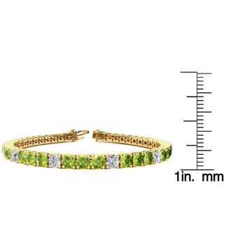 9 1/5 Carat Peridot and Diamond Alternating Tennis Bracelet In 14 Karat Yellow Gold, 7 Inches