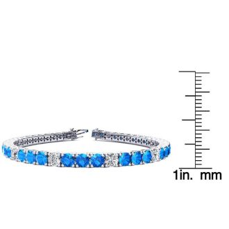 11 Carat Blue Topaz and Diamond Alternating Tennis Bracelet In 14 Karat White Gold, 7 Inches