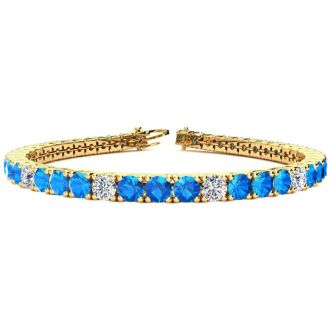 11 Carat Blue Topaz and Diamond Alternating Tennis Bracelet In 14 Karat Yellow Gold, 7 Inches