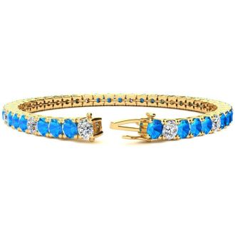 11 Carat Blue Topaz and Diamond Alternating Tennis Bracelet In 14 Karat Yellow Gold, 7 Inches