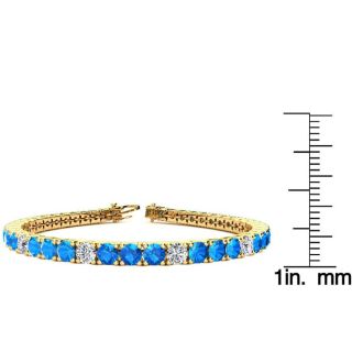 11 Carat Blue Topaz and Diamond Alternating Tennis Bracelet In 14 Karat Yellow Gold, 7 Inches