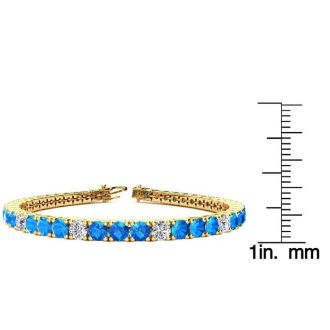 11 Carat Blue Topaz and Diamond Alternating Tennis Bracelet In 14 Karat Yellow Gold, 7 Inches