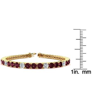 Garnet Bracelet: Garnet Jewelry: 10 Carat Garnet and Diamond Alternating Tennis Bracelet In 14 Karat Yellow Gold, 7 Inches