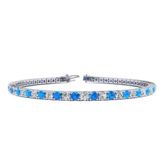5 1/2 Carat Blue Topaz And Diamond Tennis Bracelet In 14 Karat White Gold, 8 1/2 Inches