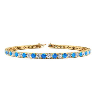 4 1/2 Carat Blue Topaz And Diamond Tennis Bracelet In 14 Karat Yellow Gold, 7 Inches
