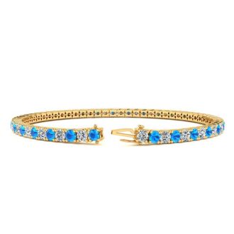 5 Carat Blue Topaz And Diamond Tennis Bracelet In 14 Karat Yellow Gold, 8 Inches