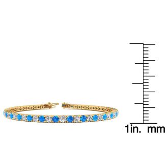 5 Carat Blue Topaz And Diamond Tennis Bracelet In 14 Karat Yellow Gold, 8 Inches
