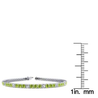 5 Carat Peridot And Diamond Alternating Tennis Bracelet In 14 Karat White Gold, 9 Inches