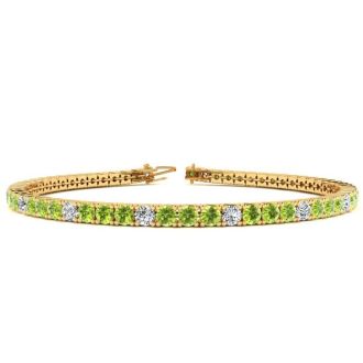 4 1/4 Carat Peridot And Diamond Alternating Tennis Bracelet In 14 Karat Yellow Gold, 7 1/2 Inches