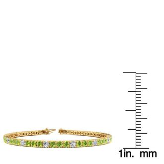 4 1/4 Carat Peridot And Diamond Alternating Tennis Bracelet In 14 Karat Yellow Gold, 7 1/2 Inches