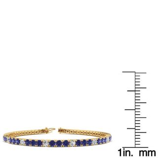 6 Carat Tanzanite And Diamond Alternating Tennis Bracelet In 14 Karat Yellow Gold, 8 1/2 Inches