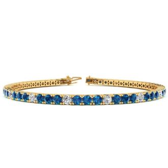 4 Carat Blue And White Diamond Alternating Tennis Bracelet In 14 Karat Yellow Gold, 7 Inches