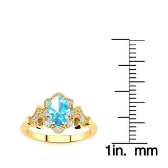 1 Carat Oval Shape Blue Topaz and Halo Diamond Vintage Ring In 14 Karat Yellow Gold
