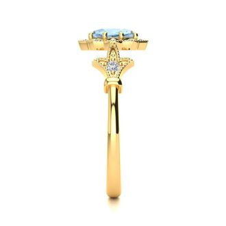 1 Carat Oval Shape Aquamarine and Halo Diamond Vintage Ring In 14 Karat Yellow Gold
