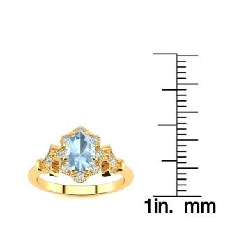 1 Carat Oval Shape Aquamarine and Halo Diamond Vintage Ring In 14 Karat Yellow Gold