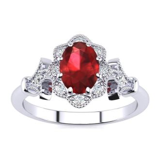 1 Carat Oval Shape Ruby and Halo Diamond Vintage Ring In 14 Karat White Gold