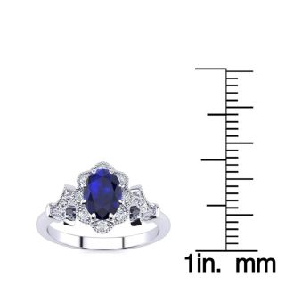 1 Carat Oval Shape Sapphire and Halo Diamond Vintage Ring In 14 Karat White Gold