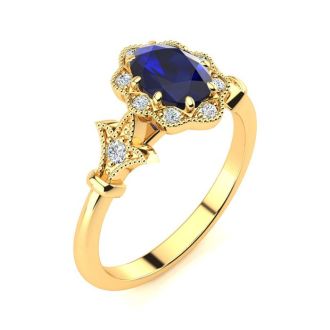 1 Carat Oval Shape Sapphire and Halo Diamond Vintage Ring In 14 Karat Yellow Gold