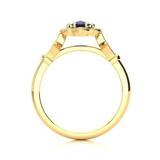 1 Carat Oval Shape Sapphire and Halo Diamond Vintage Ring In 14 Karat Yellow Gold