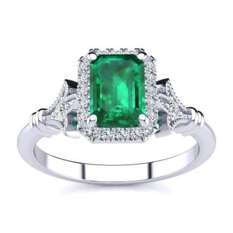 1 Carat Emerald and Halo Diamond Vintage Ring In 14 Karat White Gold