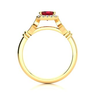 1 1/4 Carat Ruby and Halo Diamond Vintage Ring In 14 Karat Yellow Gold