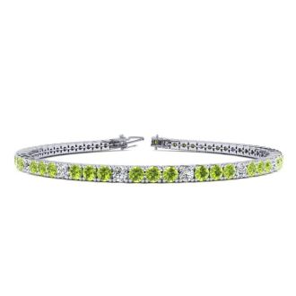 4 Carat Peridot And Diamond Alternating Tennis Bracelet In 14 Karat White Gold, 9 Inches