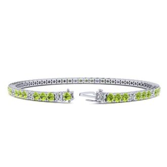 4 Carat Peridot And Diamond Alternating Tennis Bracelet In 14 Karat White Gold, 9 Inches