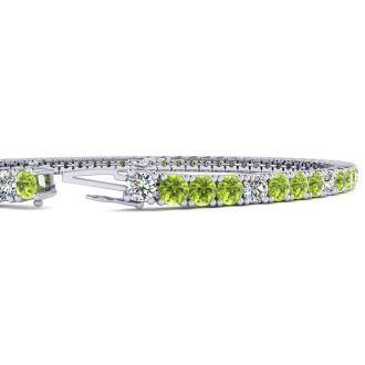 4 Carat Peridot And Diamond Alternating Tennis Bracelet In 14 Karat White Gold, 9 Inches