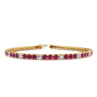 Ruby Bracelet; Ruby Tennis Bracelet; 4 3/4 Carat Ruby And Diamond Alternating Tennis Bracelet In 14 Karat Yellow Gold