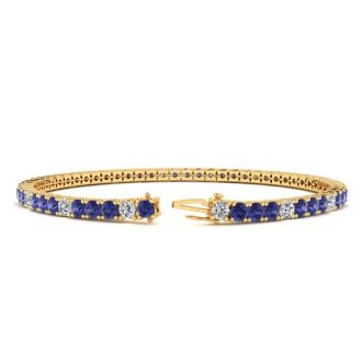 2 1/3 Carat Tanzanite And Diamond Alternating Tennis Bracelet In 14 Karat Yellow Gold, 7 1/2 Inches
